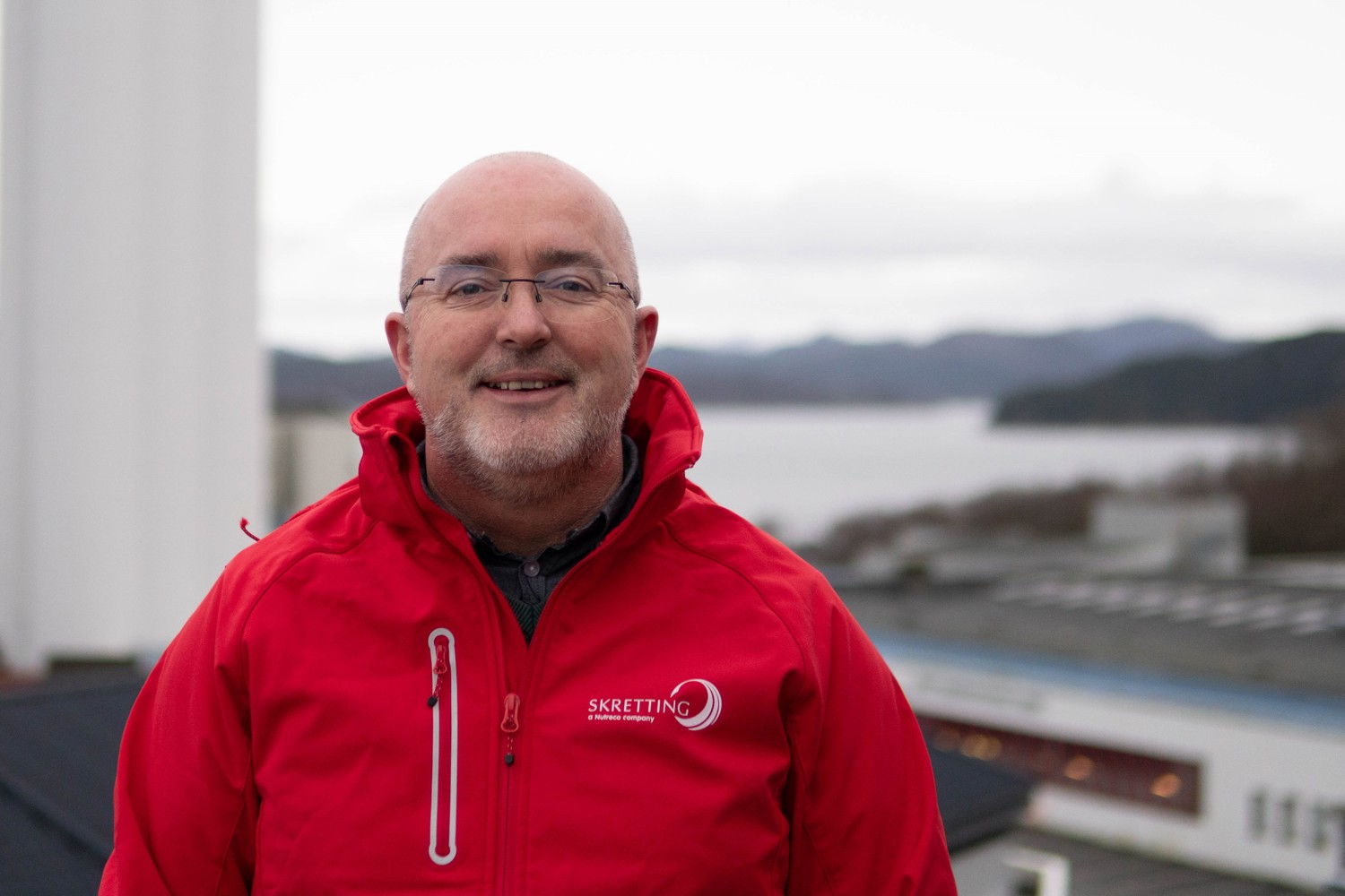 Eamonn O'Brien in front of Skretting silo