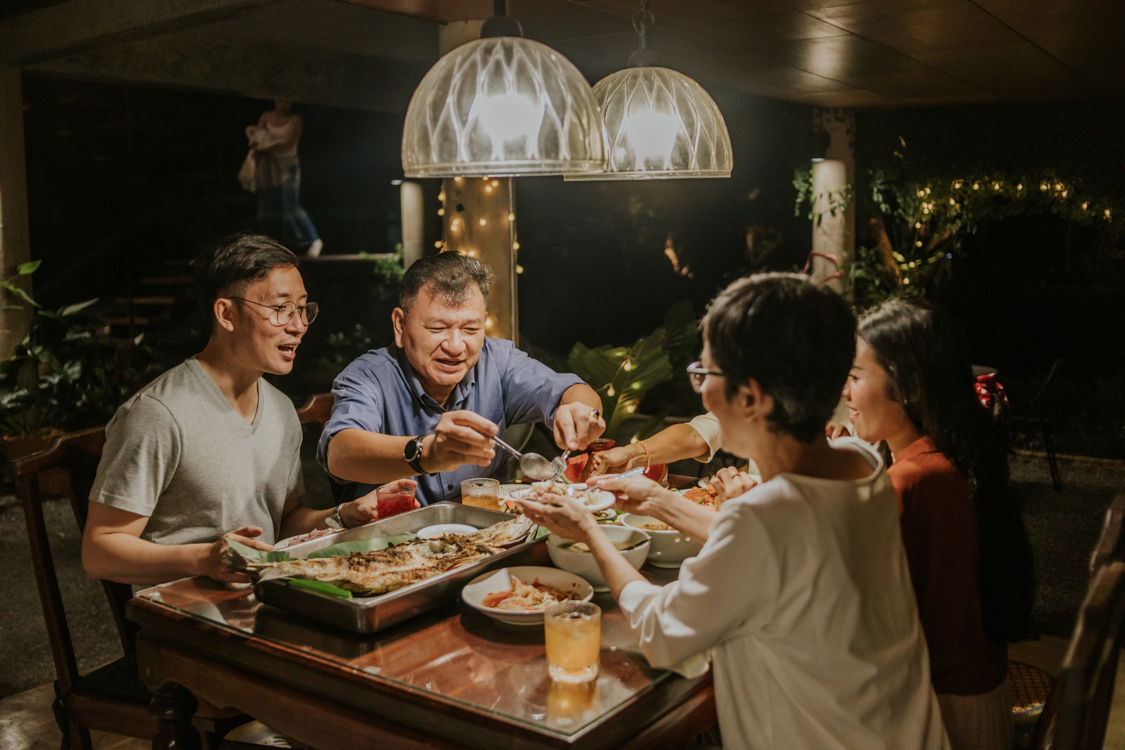 People sitting at a table sharing a meal