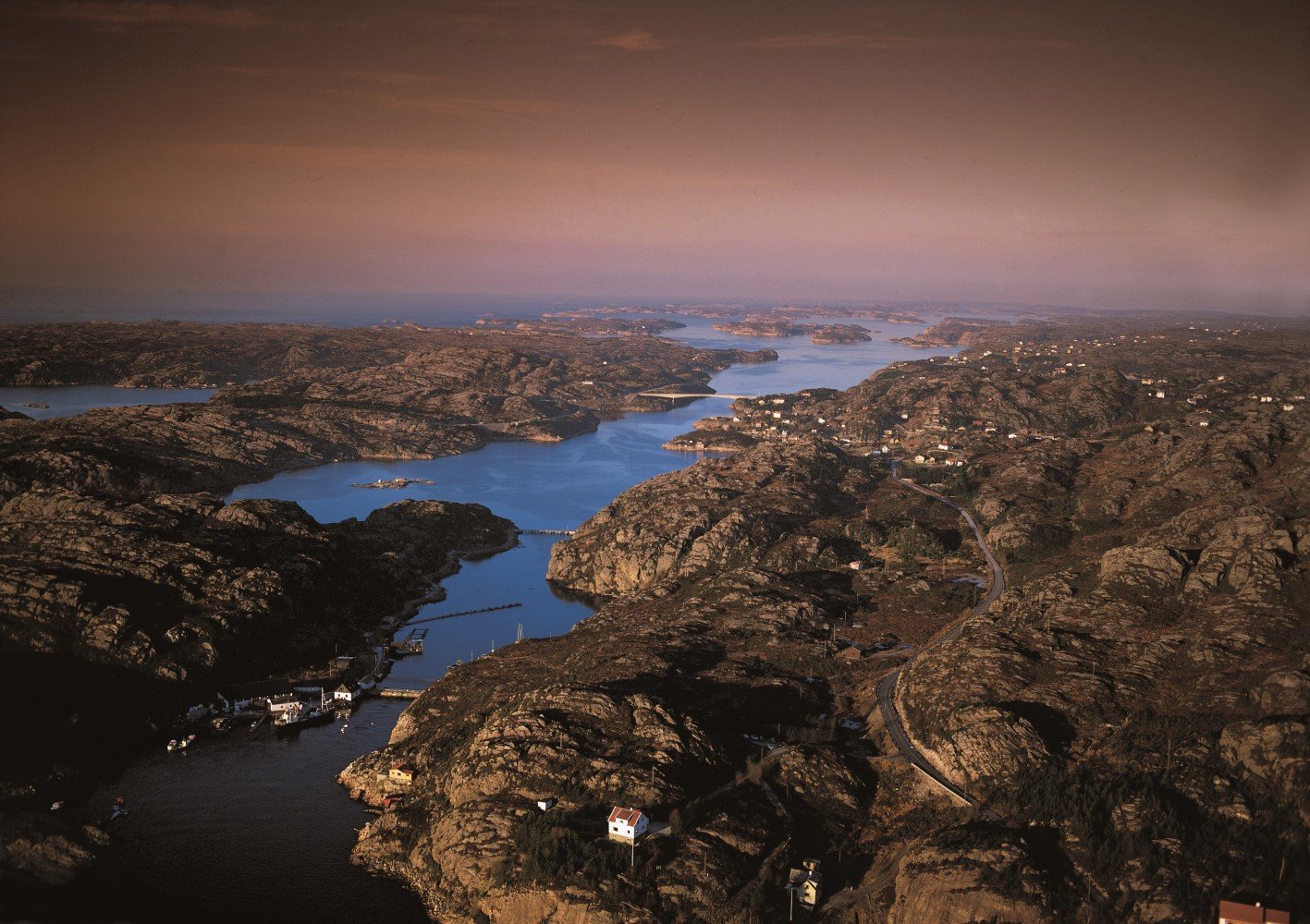 Norwegian fjord with pink sky