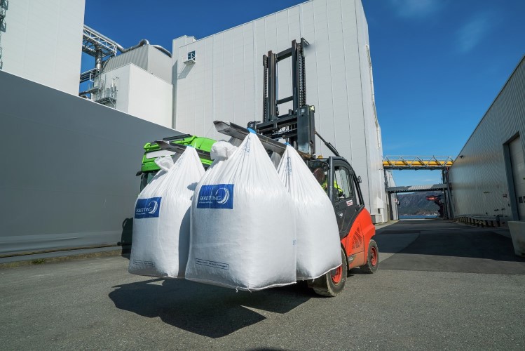 Feed bags on forklift