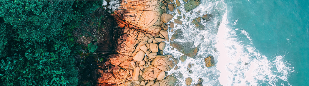 Ocean waves crashing on a sandy beach